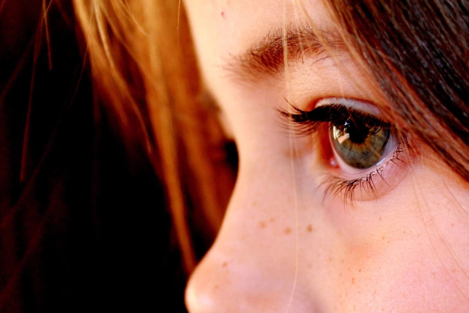 A close up of the eye of a child